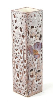 a vase with a flower design on it on a white background