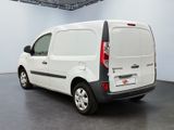 a white van that is parked in a room