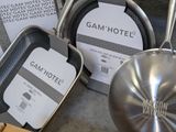 many pans and pans that are on the floor