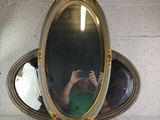 a man taking a picture of himself in a mirror
