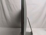 a computer monitor sitting on a stand on a white background