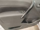 a picture of a car door handle with a key in it