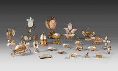 an image of a collection of antique items on a gray surface
