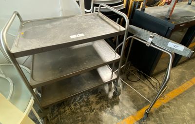 a metal cart that is sitting in a room