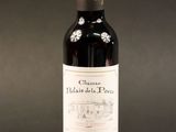 a bottle of wine that is sitting on a table