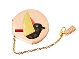 a small purse with a bird on it and a chain