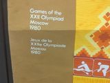 a picture of a poster on a refrigerator that says games of the xxii olympics