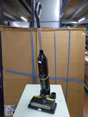 a vacuum that is sitting on a table in a room