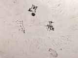 a close up of a white plate with writing on it