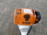 a small blower that is sitting on the ground