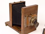 an old camera that is sitting on a table