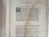 an open book with a picture of a map on it