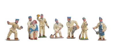 seven figurines of men dressed in military uniforms