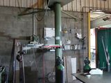 a room with a table and a lot of tools in it