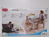 a box with a picture of a woman and a child sitting in a chair
