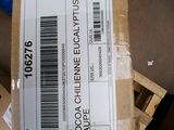 a box with a barcode on it sitting on a chair