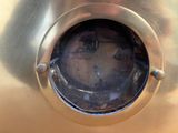 a close up of a clock on the side of a building