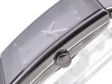 a watch that is sitting on a glass table