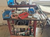 a workbench with many tools on it in a garage