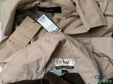 an image of a jacket with a tag on it