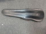 a close up of a bike seat on the floor