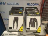 two boxes of deltaplus clothing sitting on top of a table