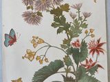 a picture of a picture of flowers and butterflies on the wall