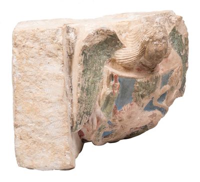 a stone sculpture of a bird with a man on it