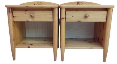 pair of wooden nightstands with drawers on each side of them