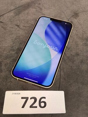 un gros plan d'un téléphone posé sur une table, avec une étiquette de prix