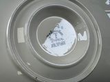 a close up of a plastic bowl with a label on it