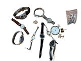 many different types of watches and bracelets on a white surface