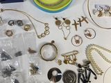 a table with a lot of jewelry on it