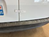 a sticker on the back of a car that has a sticker on it