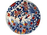 l'image d'une assiette décorative ornée de fleurs et d'oiseaux