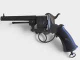 gun on a white background with a black handle and a blue grip