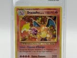 a close up of a pokemon card in a plastic holder