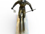 statue of a skier on a marble base on a white background