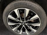 a close up view of a tire on a car
