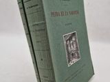 a green book with a picture of a building on it