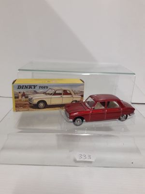 a red toy car in a clear display case