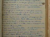 an open book with a handwritten poem on it sitting on a table