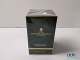a close up of a box of perfume on a table