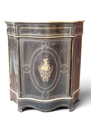 a black and gold cabinet with a gold emblem on it
