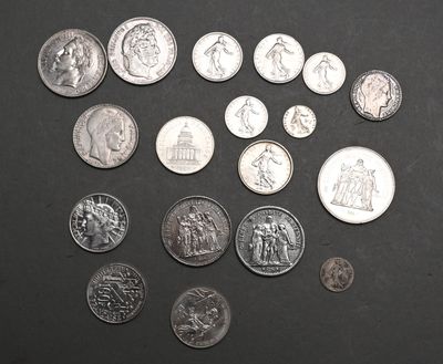 a lot of coins that are sitting on a table