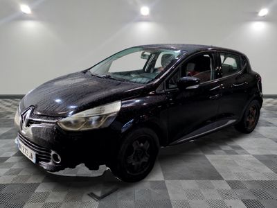 a picture of a black car parked in a garage