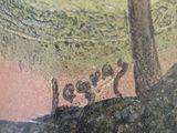a close up of a vase with a bird on it