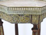 a small table with a marble top on a stand