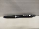 a pen that is laying on a box