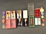many medals and medals on display on a table